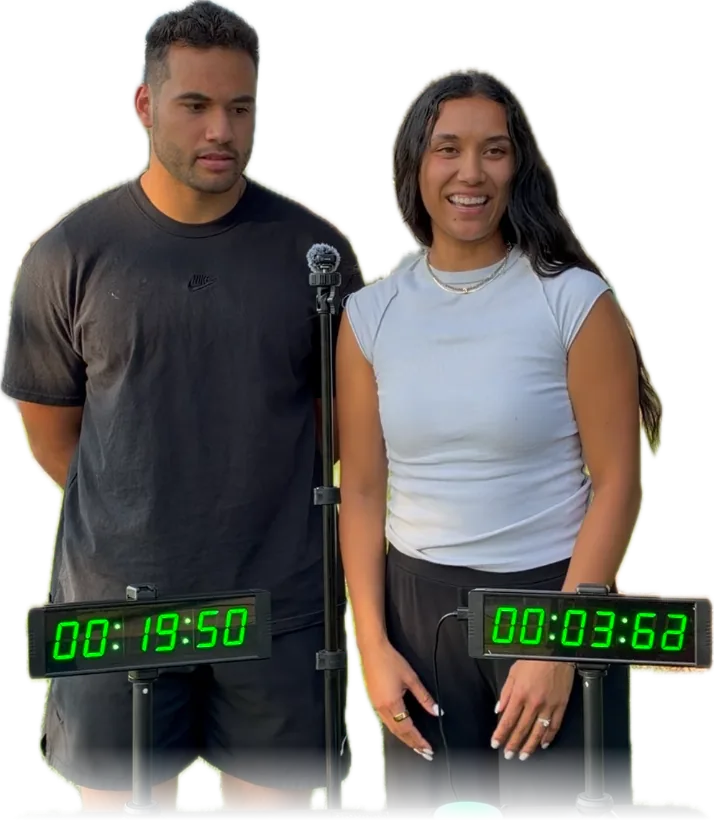 Two contestants at the buzzer with their timers