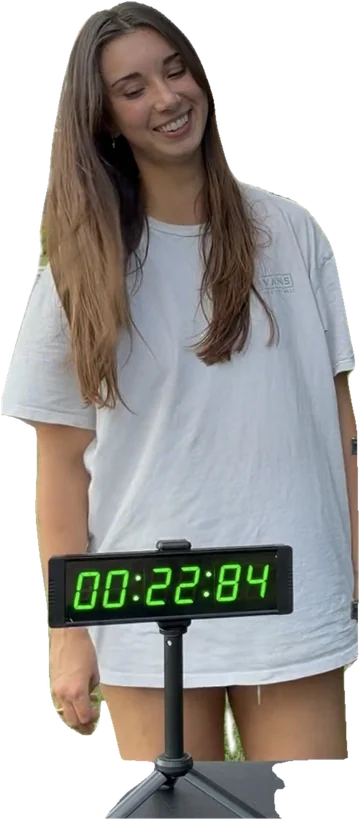 Contestant beside the countdown clock